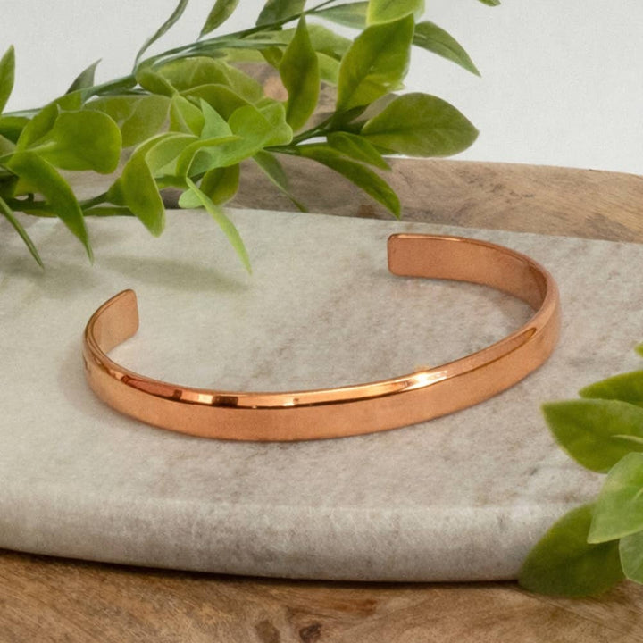Glatpoleret klemmearmbånd i kobber